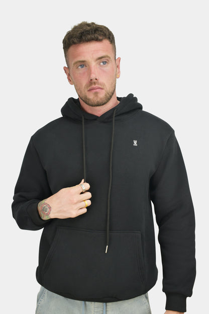 Front view of the Obsidian black hoodie with drawcords and embroidered chest crest
